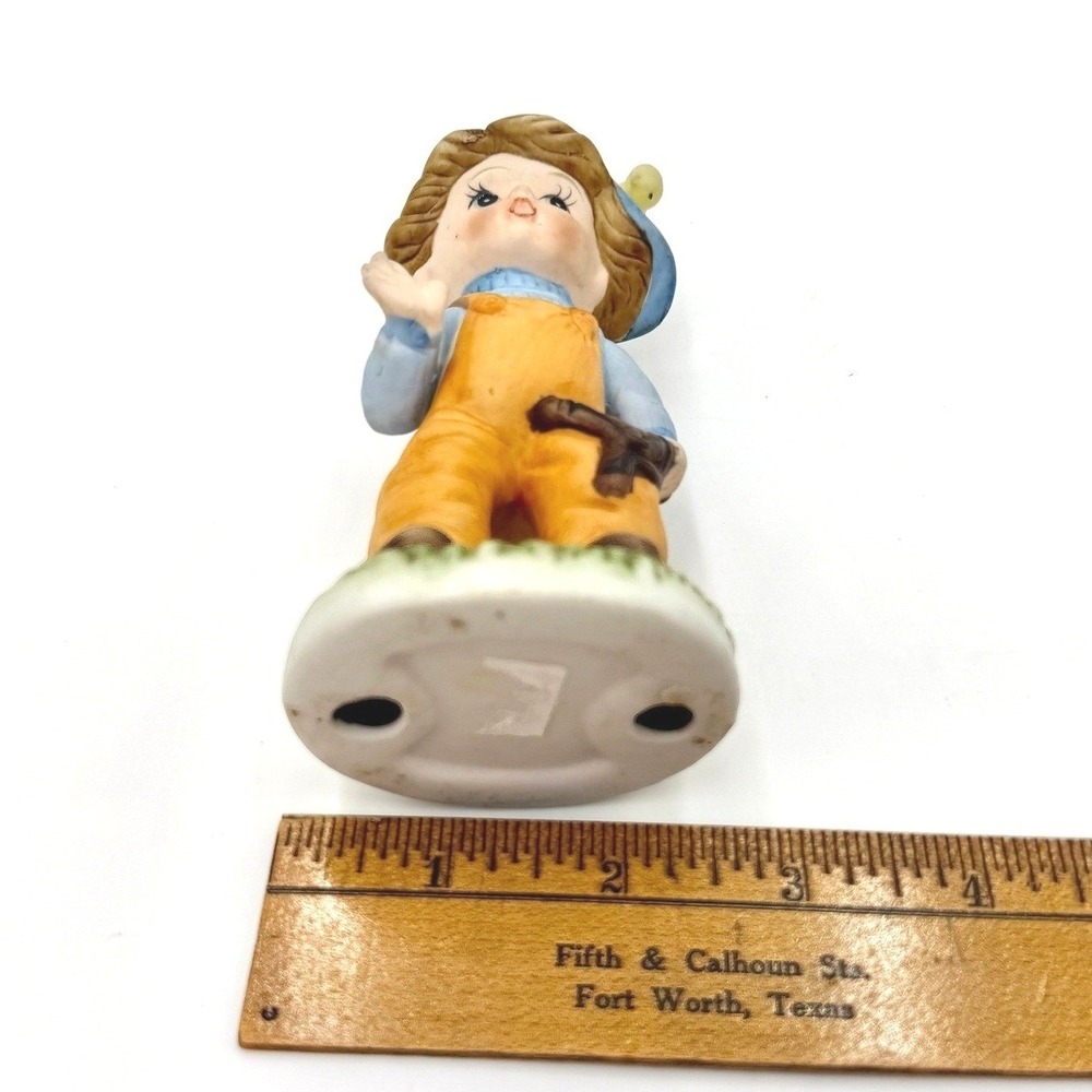 Vintage Bisque Porcelain Boy Figurine Slingshot Bird Hat Orange Overalls - Picture 5 of 6